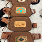 AZTEC LEATHER TOOLED CROSSBODY BAGS