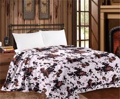COW PRINT GIANT KING PLUSH BLANKET